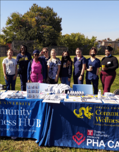 HUB staff tabling a community event